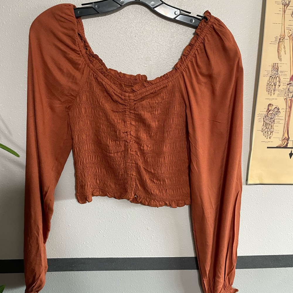Orange off the shoulder cropped top